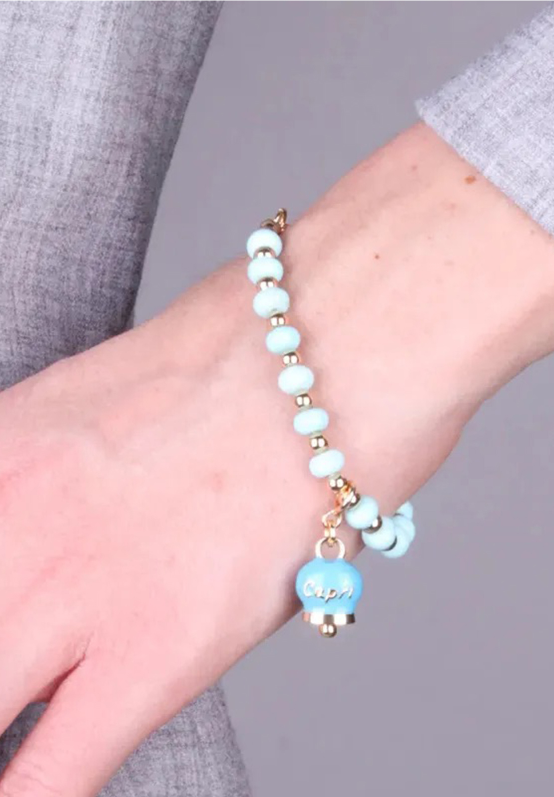 AMO CAPRI BRACCIALE SFERE CAMPANA TURCHESE
