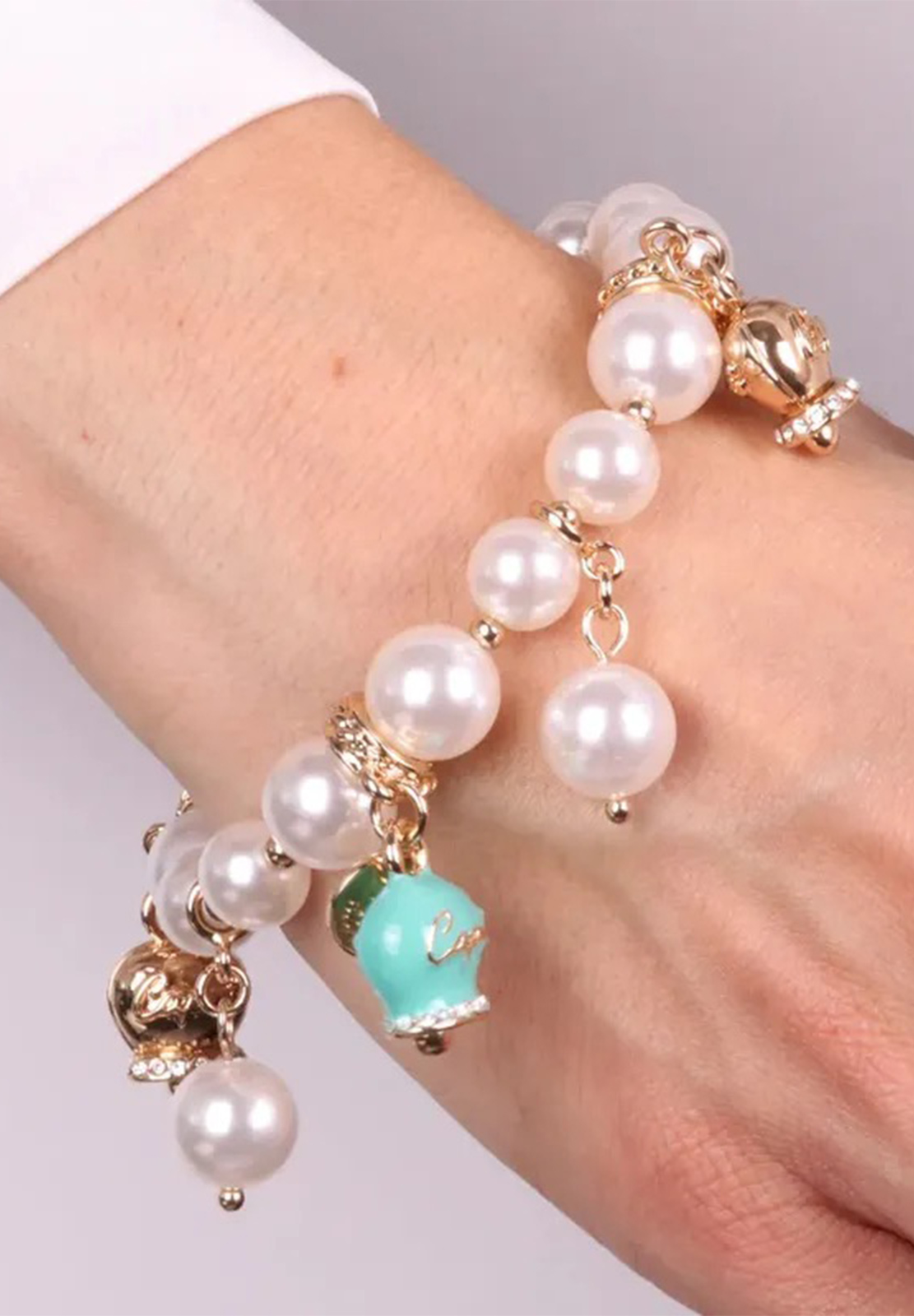 AMO CAPRI BRACCIALE PERLE E CAMPANA VERDE