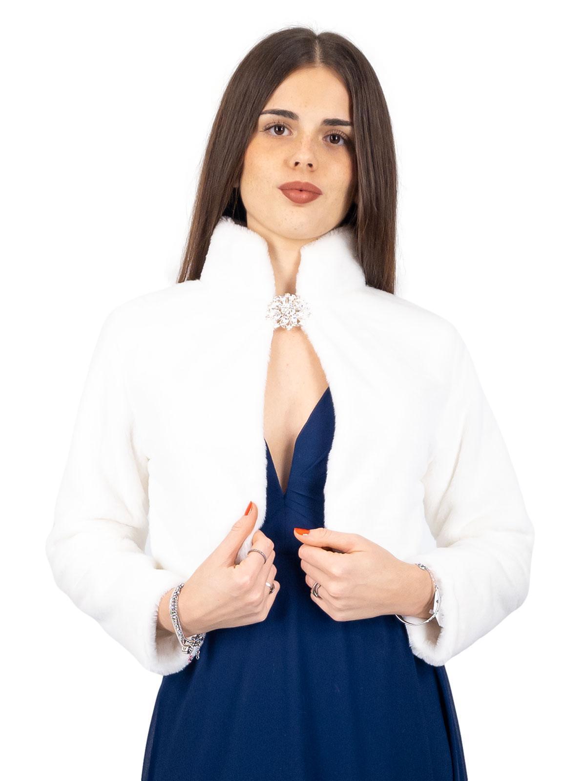 Elegant short faux fur jacket with decorative brooch