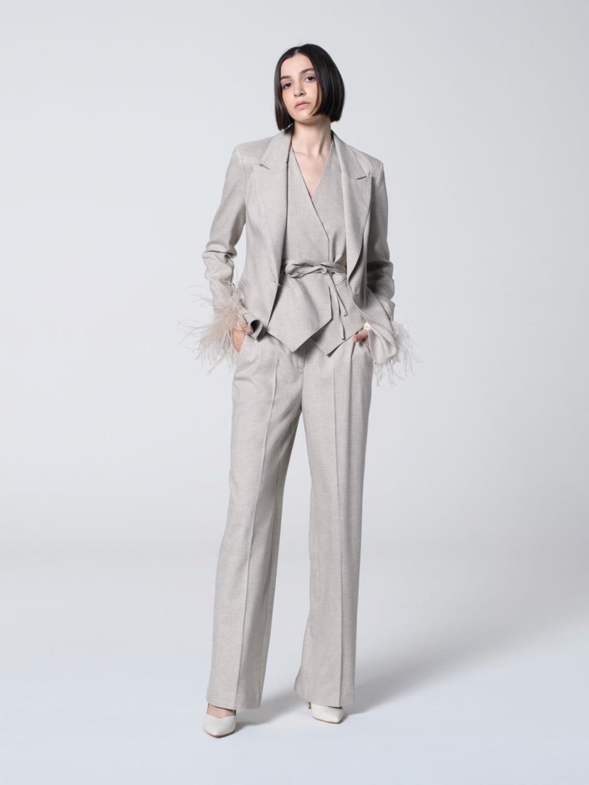 Tailleur pantaloni larghi eleganti con giacca e gilet