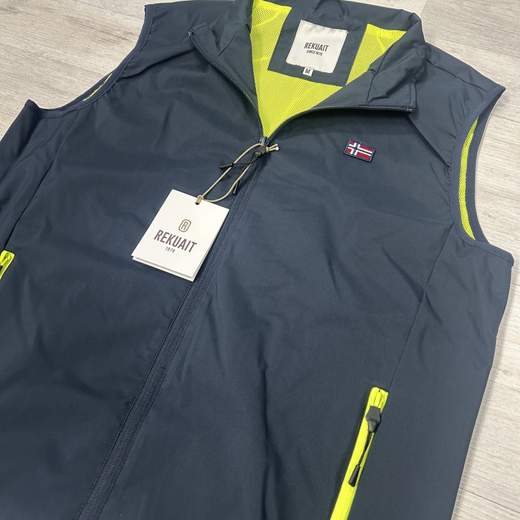 Gilet uomo Rekuait Leggero con dettagli fluo.