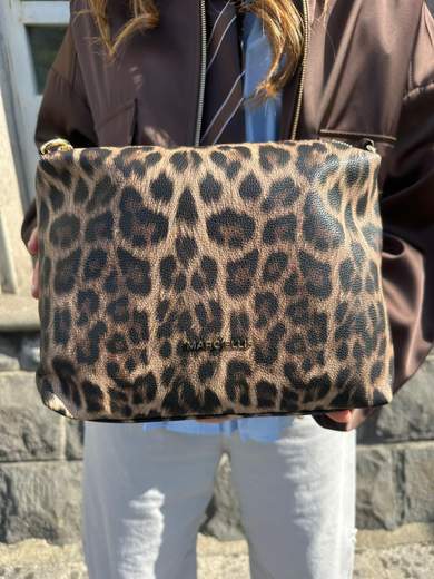 MARC ELLIS HOLLY LEO