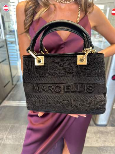 MARC ELLIS WENDI S