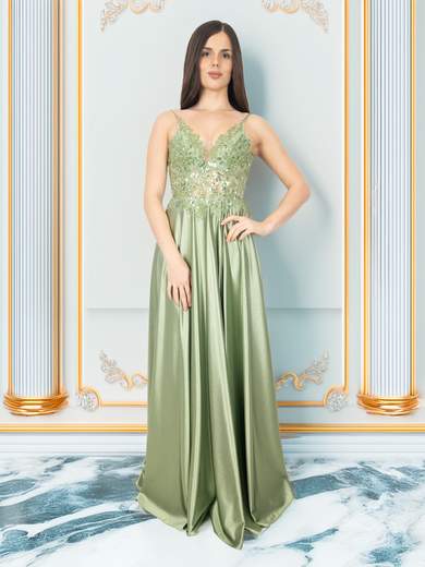 Long formal dress with embellished bodice and slit