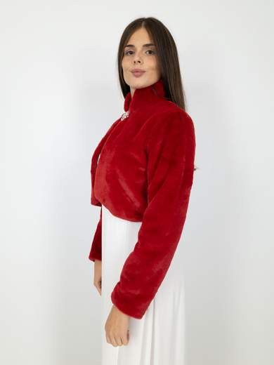 Elegant short faux fur jacket with decorative brooch