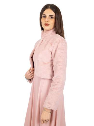 Elegant short faux fur jacket with decorative brooch