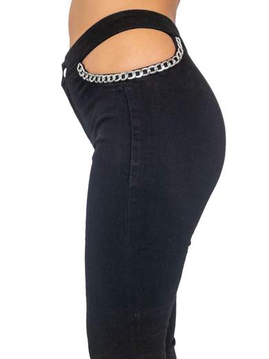 Jeans a zampa donna elasticizzati a vita alta aperti sui fianchi