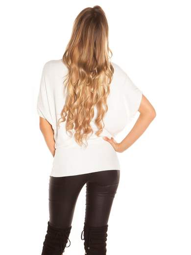 Maglia lunga con fiocco cucito a mano – Eleganza e comfort quotidiano