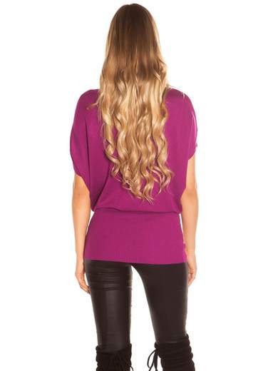 Maglia lunga con fiocco cucito a mano – Eleganza e comfort quotidiano