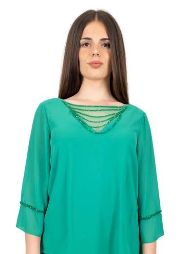 Pantaloni e casacca eleganti per cerimonia da signora curvy