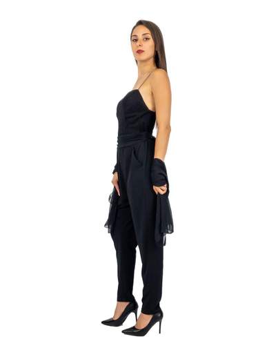 Tuta elegante con corpetto in lurex e cavallo basso