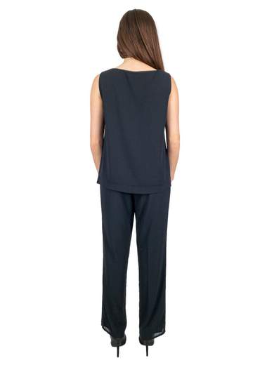 Pantaloni e top eleganti con spolverino corto per signora
