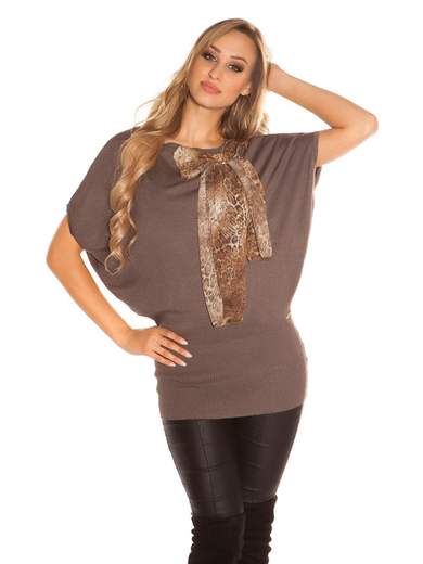 Maglia lunga con fiocco cucito a mano – Eleganza e comfort quotidiano