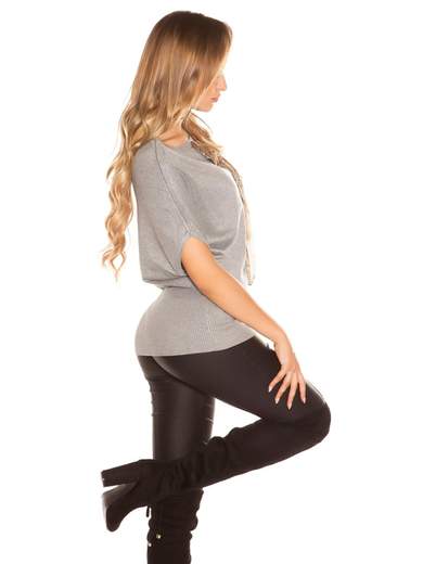 Maglia lunga con fiocco cucito a mano – Eleganza e comfort quotidiano