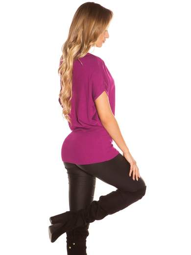 Maglia lunga con fiocco cucito a mano – Eleganza e comfort quotidiano