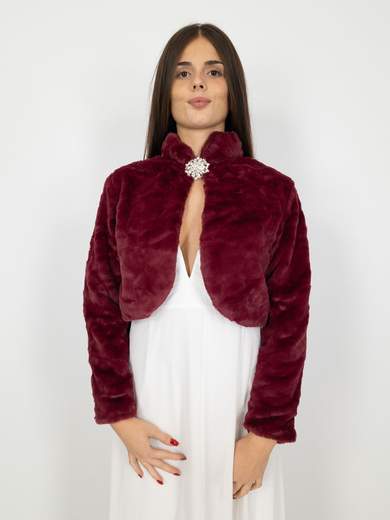 Elegant short faux fur jacket with decorative brooch