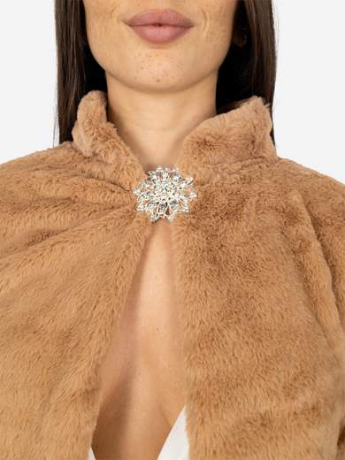 Elegant short faux fur jacket with decorative brooch