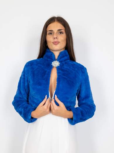 Elegant short faux fur jacket with decorative brooch