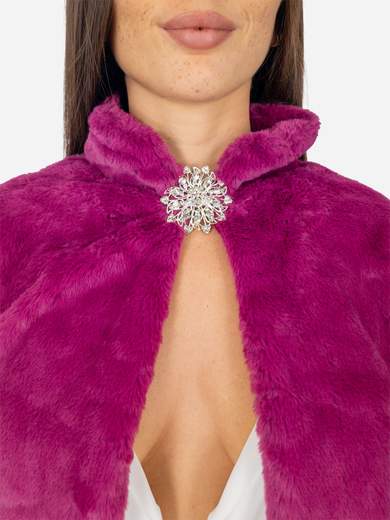 Elegant short faux fur jacket with decorative brooch
