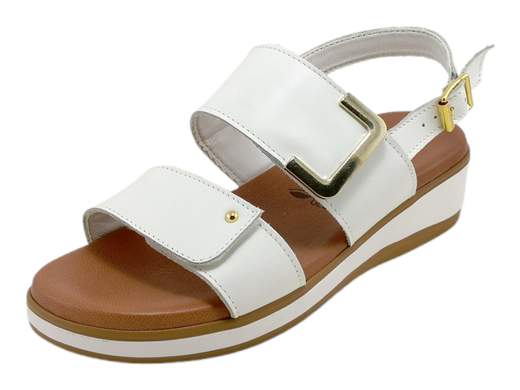 Scopri i Sandali Donna Susimoda 22430/06 in pelle con fasce regolabili e accessorio dorato, comodi e ammortizzati, su Laporta Calzature. Acquista ora!<br /><br />I Sandali Donna Susimoda 22430/06, disponibili su Laporta Calzature, uniscono eleganza e comfort, perfetti per tutte le occasioni, sia in città che in vacanza. <br />Realizzati con due ampie fasce in raffinata pelle regolabili a strappo, sono impreziositi da un elegante accessorio dorato. <br />La fodera interamente in pelle assicura una calzata confortevole, mentre il comodo fondo zeppa di 3,5 cm in gomma leggera offre leggerezza e stabilità. Il sottopiede imbottito in pelle PIUMA GEL, indeformabile, garantisce un'ammortizzazione eccezionale a ogni passo. <br />La chiusura con cinturino posteriore e fibbia, insieme all’elastico nascosto, assicura una calzata perfetta. <br />Aggiungi comfort e stile al tuo look estivo, acquista ora su Laporta Calzature!