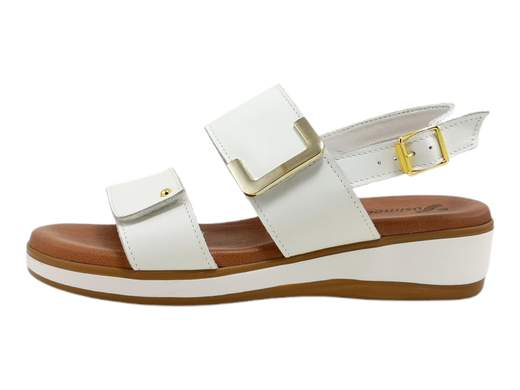 Scopri i Sandali Donna Susimoda 22430/06 in pelle con fasce regolabili e accessorio dorato, comodi e ammortizzati, su Laporta Calzature. Acquista ora!<br /><br />I Sandali Donna Susimoda 22430/06, disponibili su Laporta Calzature, uniscono eleganza e comfort, perfetti per tutte le occasioni, sia in città che in vacanza. <br />Realizzati con due ampie fasce in raffinata pelle regolabili a strappo, sono impreziositi da un elegante accessorio dorato. <br />La fodera interamente in pelle assicura una calzata confortevole, mentre il comodo fondo zeppa di 3,5 cm in gomma leggera offre leggerezza e stabilità. Il sottopiede imbottito in pelle PIUMA GEL, indeformabile, garantisce un'ammortizzazione eccezionale a ogni passo. <br />La chiusura con cinturino posteriore e fibbia, insieme all’elastico nascosto, assicura una calzata perfetta. <br />Aggiungi comfort e stile al tuo look estivo, acquista ora su Laporta Calzature!