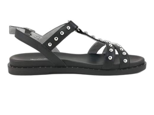 Sandali bassi NeroGiardini con borchie glam e fussbett imbottito. Sportivi, grintosi e comodissimi. Stile Made in Italy ai tuoi piedi!<br /><br />Se cerchi sandali bassi da donna che siano comodi ma con grinta da vendere, i *NeroGiardini E513480D* sono la risposta fashion ai tuoi desideri (e ai tuoi piedi stanchi).<br /><br />Dallo stile sportivo con una bella inclinazione glam, questi sandali “a ragnetto” in vera pelle non passano certo inosservati grazie alle borchie in acciaio lucido—piccole, ma toste, come te.<br /><br />Il cinturino alla caviglia con fibbia regolabile assicura una calzata perfetta, mentre il fussbett in pelle (aka sottopiede) è così imbottito e sagomato che potresti scordarti di averli indosso. Il fondo piatto in gomma antiscivolo è flessibile e sicuro, anche nelle giornate più agitate.<br /><br />Ideali per chi ama camminare tanto senza rinunciare allo stile, per look casual con quel tocco di rock, o per outfit estivi da urlo.<br />Sono versatili, comodi, stilosi—e, ovviamente, artigianali e Made in Italy.