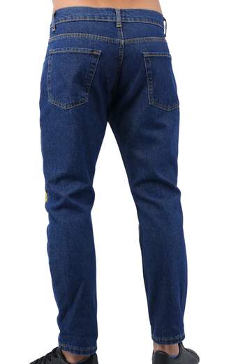 Jeans uomo in denim blu con stampa graffiti e design streetwear