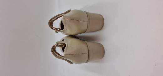 ANASTASIO DECOLLETE IN PELLE LAMINATA