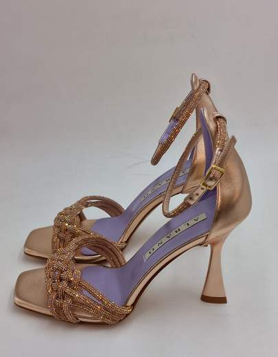 ALBANO SADALO PELLE E STRASS