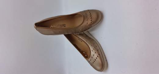 ANASTASIO DECOLLETE IN PELLE LAMINATA