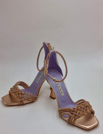 ALBANO SADALO PELLE E STRASS