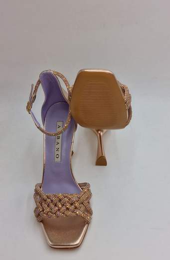 ALBANO SADALO PELLE E STRASS