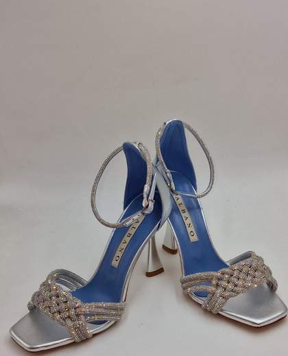 ALBANO SADALO PELLE E STRASS